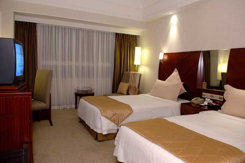 Merry Hotel Shanghai Room photo